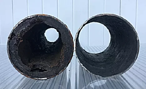 Opération de fraisage et curage de canalisation avec équipement spécialisé pour préparation avant chemisage - Photo de notre partenaire Expert du Chemisage